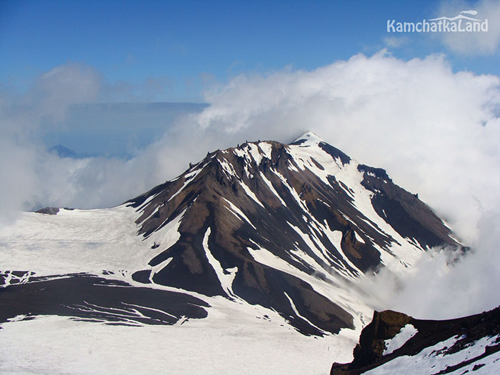 The mountain range of the volcano in the snow.