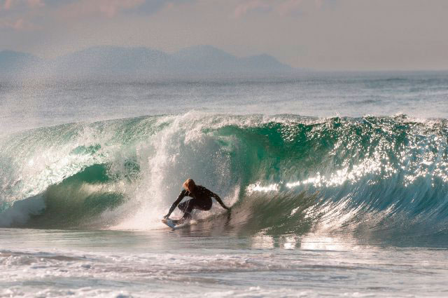 Cutting through the waves.