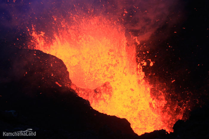 Lava explodes out of the crater.